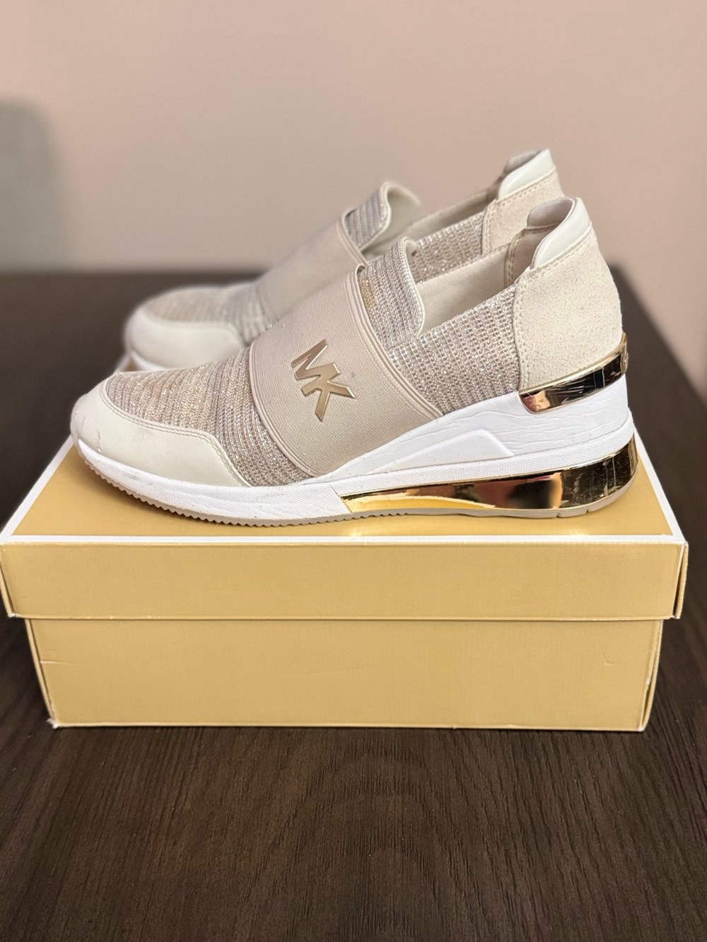 Michael Kors Cream Slip-On Sneakers with Gold Accents